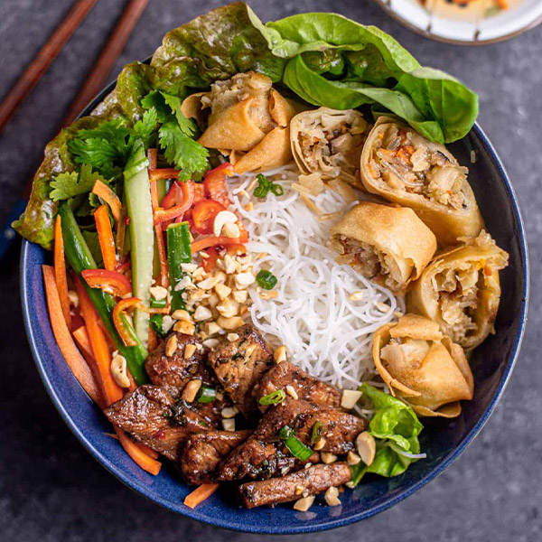 Grilled pork and egg roll vermicelli bowl
